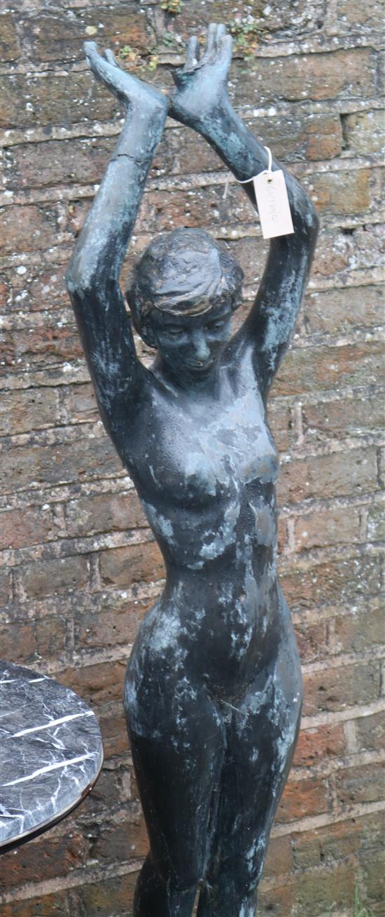 Metal figure of a nude lady